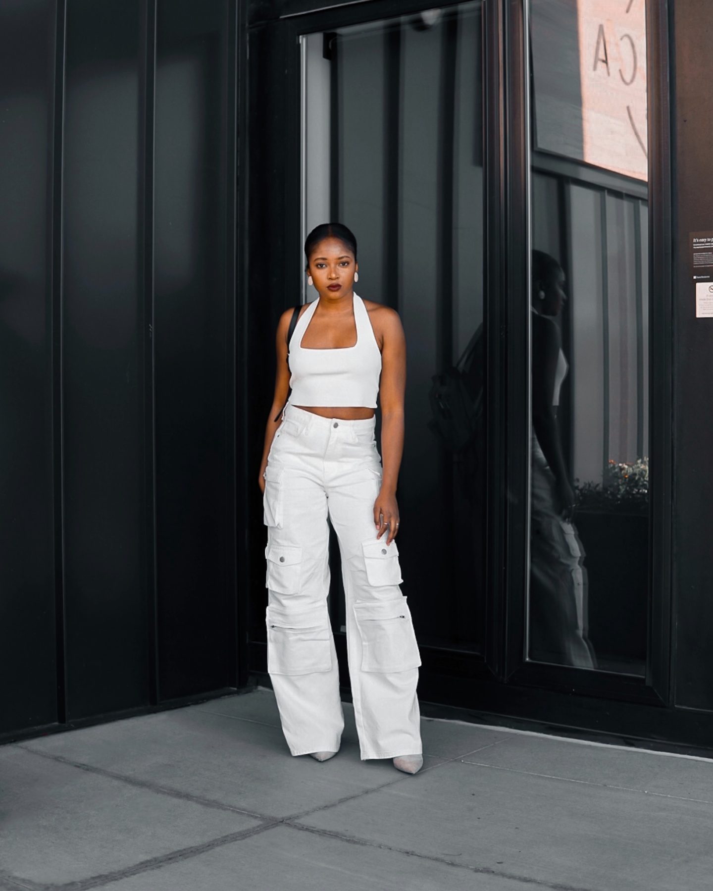 woman in all white cargo pants fall outfit idea